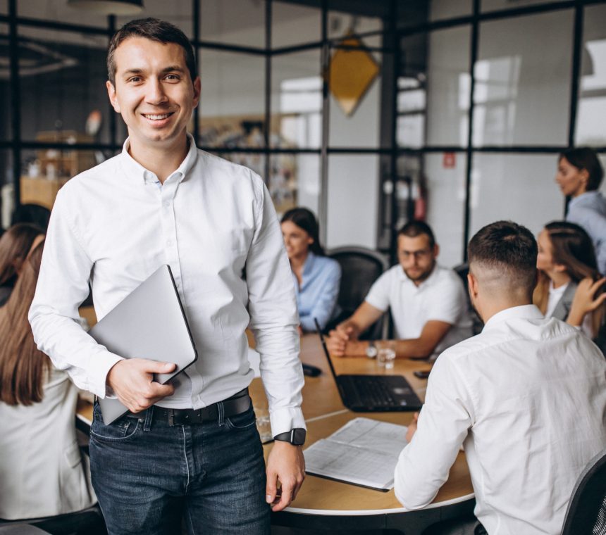 Group of people working out business plan in an office Group of people working out business plan in an office